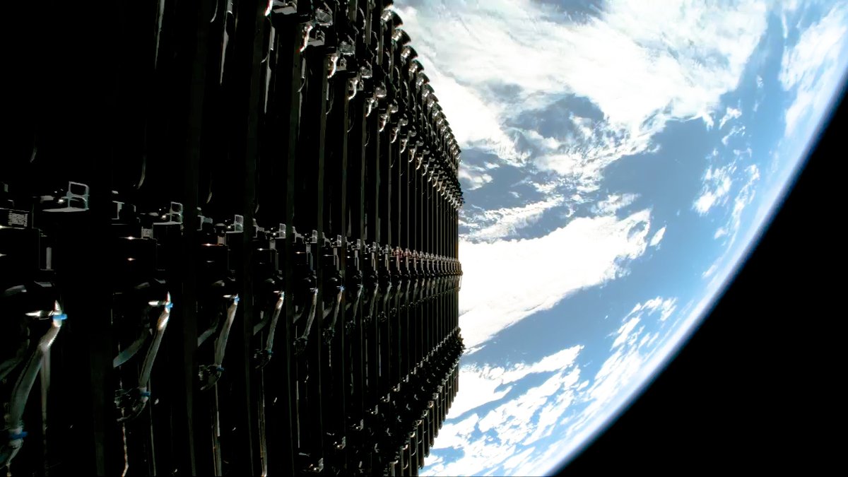 SpaceX Starlink satellites deploying in orbit, the commercial architecture underlying the Starshield national security network.